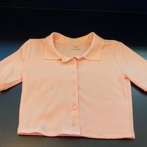 Pink cropped button up top
